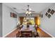 Dining room with hardwood floors and view to backyard at 101 Marathon Ln, Sanford, FL 32771