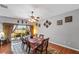 Bright dining room with hardwood floors and backyard access at 101 Marathon Ln, Sanford, FL 32771