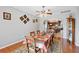 Dining area with a large table and access to kitchen at 101 Marathon Ln, Sanford, FL 32771