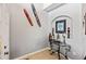 Bright entryway with glass-top console table, artwork, and decorative wall hangings at 101 Marathon Ln, Sanford, FL 32771