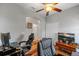 Home office with two comfortable chairs and a large window at 101 Marathon Ln, Sanford, FL 32771