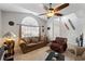 Cozy living room with comfortable seating and a large window at 101 Marathon Ln, Sanford, FL 32771