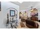 Inviting living room with decorative accents and a view into the dining area at 101 Marathon Ln, Sanford, FL 32771