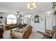 Bright living room featuring a comfy seating area and ceiling fan at 101 Marathon Ln, Sanford, FL 32771