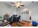 Home office with two computer desks, bookshelves, and an adjacent bathroom at 101 Marathon Ln, Sanford, FL 32771