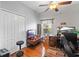 Home office with a desk, two chairs, and built in wardrobe at 101 Marathon Ln, Sanford, FL 32771