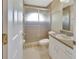 Clean bathroom with a shower/tub combo and updated vanity at 1185 N Old Mill Dr, Deltona, FL 32725