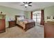 Spacious bedroom with carpeted floors and large window at 1185 N Old Mill Dr, Deltona, FL 32725