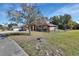 Two-story house with a spacious yard and mature trees at 1185 N Old Mill Dr, Deltona, FL 32725