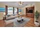 Bright living room with hardwood floors and stylish furnishings at 1185 N Old Mill Dr, Deltona, FL 32725