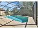 Private screened pool with open backyard views at 1185 N Old Mill Dr, Deltona, FL 32725