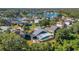 Bird's-eye view of a home with a pool and screened enclosure at 3113 Birds Rest Pl, Kissimmee, FL 34743