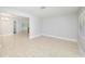 Open dining area with tile floors and view into adjacent kitchen at 3135 Evelyn Scott St, Apopka, FL 32712