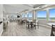 Ocean view community room with tables and chairs at 3311 S Atlantic Ave # 304, Daytona Beach Shores, FL 32118
