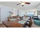 Bright dining room features a large wooden table with seating for eight and ocean views at 3311 S Atlantic Ave # 304, Daytona Beach Shores, FL 32118