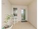 Welcoming entryway with tiled floor and balcony access at 3311 S Atlantic Ave # 304, Daytona Beach Shores, FL 32118