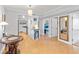 Bright hallway with tile flooring, mirror, and access to bedrooms and kitchen at 3311 S Atlantic Ave # 304, Daytona Beach Shores, FL 32118