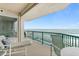 Spacious balcony boasting stunning ocean views and patio furniture at 3311 S Atlantic Ave # 304, Daytona Beach Shores, FL 32118