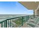 Relaxing balcony with stunning ocean views and comfortable seating at 3311 S Atlantic Ave # 304, Daytona Beach Shores, FL 32118