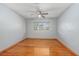 Spacious bedroom with hardwood floors and a ceiling fan at 412 Maryland Ter, Deland, FL 32724