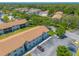 Aerial perspective showcasing the community's layout and parking at 415 Banana Cay Dr # F, South Daytona, FL 32119