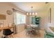 Dining area with a round table and four chairs at 415 Banana Cay Dr # F, South Daytona, FL 32119