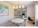 Bright dining room with a table and chairs at 415 Banana Cay Dr # F, South Daytona, FL 32119