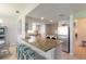 Kitchen with granite countertops, stainless steel appliances, and breakfast bar at 415 Banana Cay Dr # F, South Daytona, FL 32119