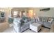 Open living room showcasing a kitchen and dining area at 415 Banana Cay Dr # F, South Daytona, FL 32119