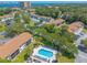 Refreshing community pool surrounded by lounge chairs for relaxation at 415 Banana Cay Dr # F, South Daytona, FL 32119