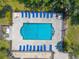 Inviting community pool with ample lounge chairs at 415 Banana Cay Dr # F, South Daytona, FL 32119