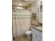 Clean bathroom with shower/tub combo at 5300 S Atlantic Ave # 19-502, New Smyrna Beach, FL 32169