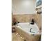 Corner bathtub with decorative accents and seashells at 5300 S Atlantic Ave # 19-502, New Smyrna Beach, FL 32169