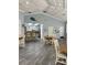 Community room with kitchen and tables at 5300 S Atlantic Ave # 19-502, New Smyrna Beach, FL 32169