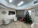 Relaxing seating area with fireplace and TV in community room at 5300 S Atlantic Ave # 19-502, New Smyrna Beach, FL 32169
