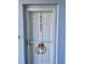 Inviting condo entrance with wreath at 5300 S Atlantic Ave # 19-502, New Smyrna Beach, FL 32169