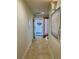 Bright hallway with access to other rooms at 5300 S Atlantic Ave # 19-502, New Smyrna Beach, FL 32169
