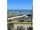 Oceanfront view with parking and tennis court at 5300 S Atlantic Ave # 19-502, New Smyrna Beach, FL 32169