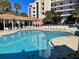 Relaxing freeform pool with plenty of lounge chairs at 5300 S Atlantic Ave # 19-502, New Smyrna Beach, FL 32169