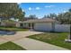 Single-story house with attached garage and driveway, surrounded by green lawn at 552 Nardello Dr, Deltona, FL 32725