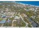 Aerial view showing the house's location in a coastal neighborhood at 75 Jennifer Cir, Ponce Inlet, FL 32127