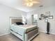 Bedroom with a queen-size bed and access to a bathroom at 926 Denali Dr, Orange City, FL 32763