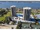 Aerial view of Ocean's West One, showing tennis courts and waterfront at 1 Oceans West Blvd # 17A2, Daytona Beach Shores, FL 32118