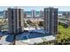 Stunning aerial view of two condo buildings near the ocean at 1 Oceans West Blvd # 17A2, Daytona Beach Shores, FL 32118