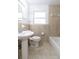 Clean bathroom with bathtub, toilet and vanity at 1068 North St, Daytona Beach, FL 32114