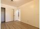 Bright bedroom with wood-look floors and a large closet at 1068 North St, Daytona Beach, FL 32114