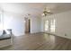 Bedroom with vinyl plank flooring and access to backyard at 1068 North St, Daytona Beach, FL 32114