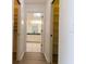 Hallway with two closets and access to bathroom at 1068 North St, Daytona Beach, FL 32114