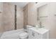 Updated bathroom with glass sink and tile shower at 1422 W Kaley Ave, Orlando, FL 32805