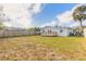 Private backyard with a wooden fence at 1631 Granada Ave, Daytona Beach, FL 32117